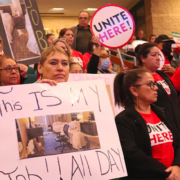 Housekeepers speak in favor of the Hotel Worker Protection Ordinance at Irvine City Hall in 2022